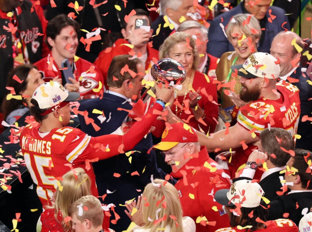 Kansas City Chiefs' Patrick Mahomes and Travis Kelce celebrate with the Vince Lombardi Trophy after winning Super Bowl LVIII in Las Vegas on February 11, 2024.