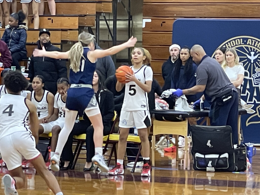 Monsignor Scanlan's Diamond Fields (#5) inbounds as St. Joseph by the Sea's Danielle Williamsen (#21) defends. St. Joseph by the Sea prevailed, 60-57, on Sunday, February 25, 2024.