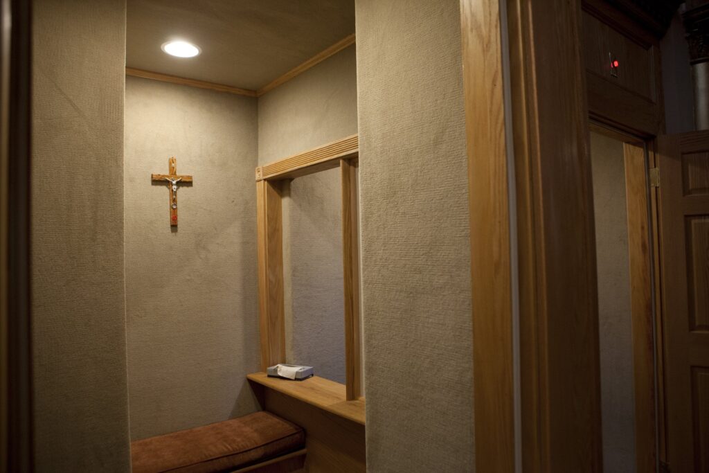 A confessional is seen at the Memorial Church of the Holy Sepulcher on the grounds of the Franciscan Monastery in Washington in this file photo from January 30, 2013.