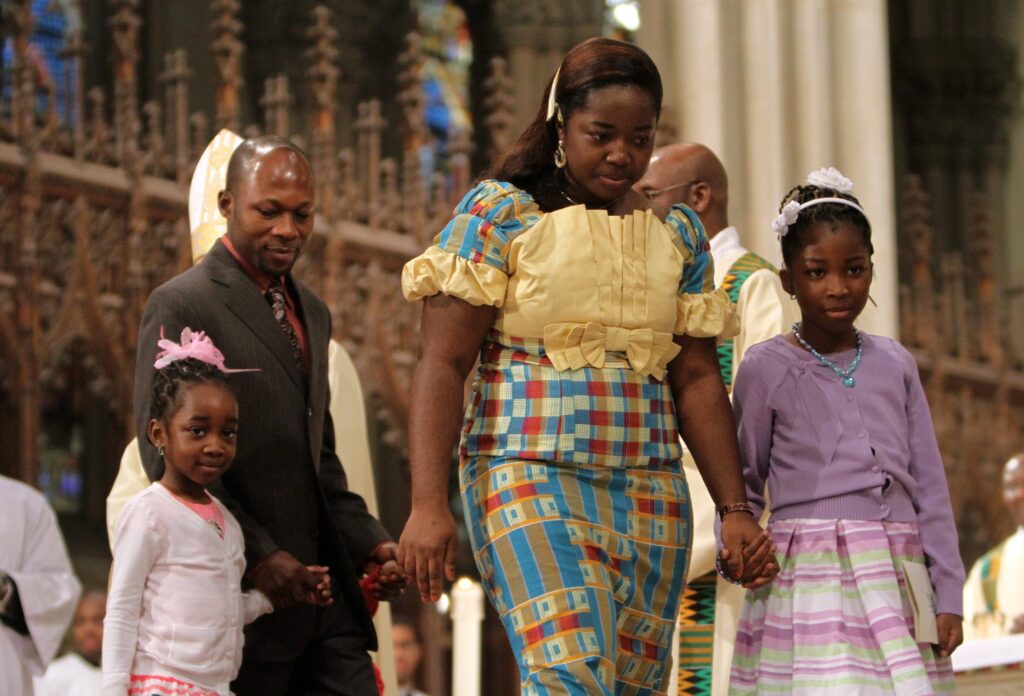 A family is pictured in a file photo after presenting the gifts during Mass at St. Patrick's Cathedral in New York City.