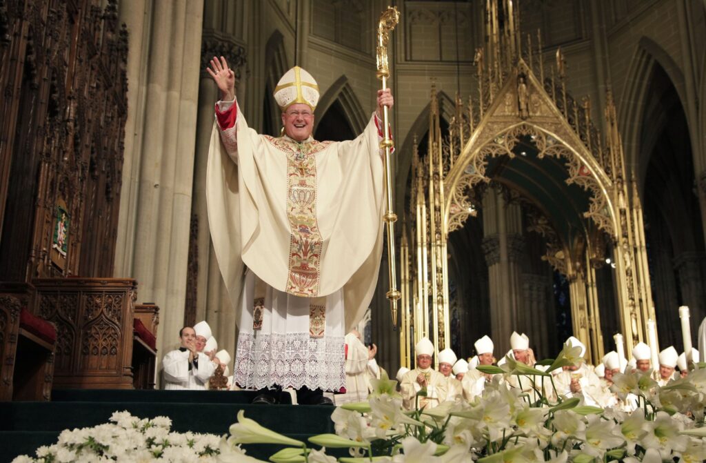 Archbishop Timothy M. Dolan acknowledges applause from the crowd during his installation Mass at St. Patrick's Cathedral in New York April 15, 2009.