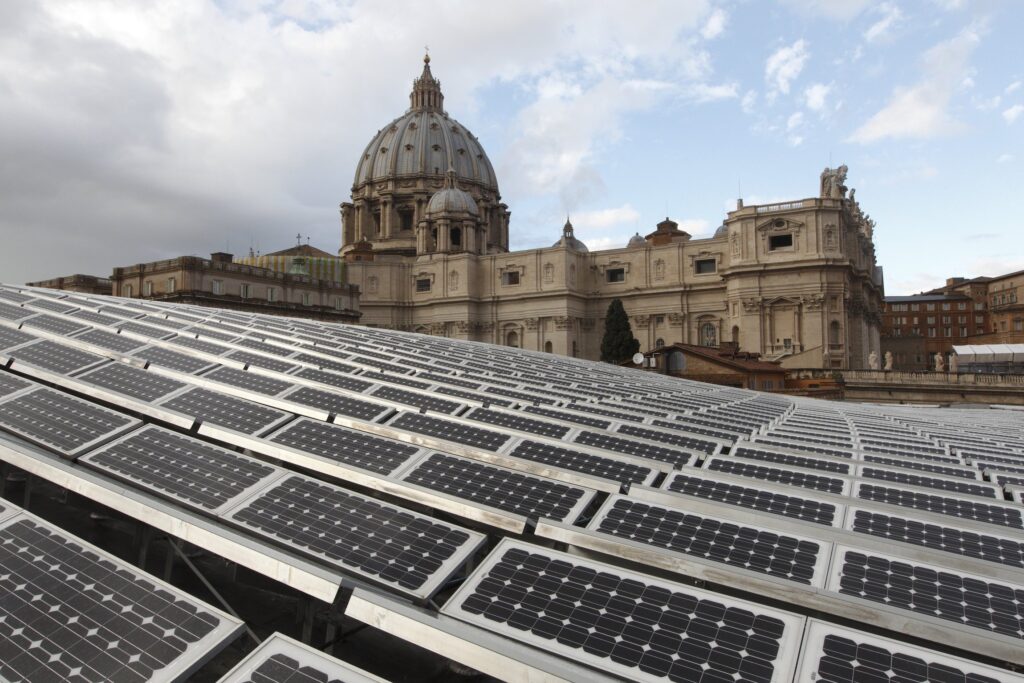 Solar panels are seen on the roof of the Paul VI audience hall at the Vatican in this December 1, 2010, file photo.
