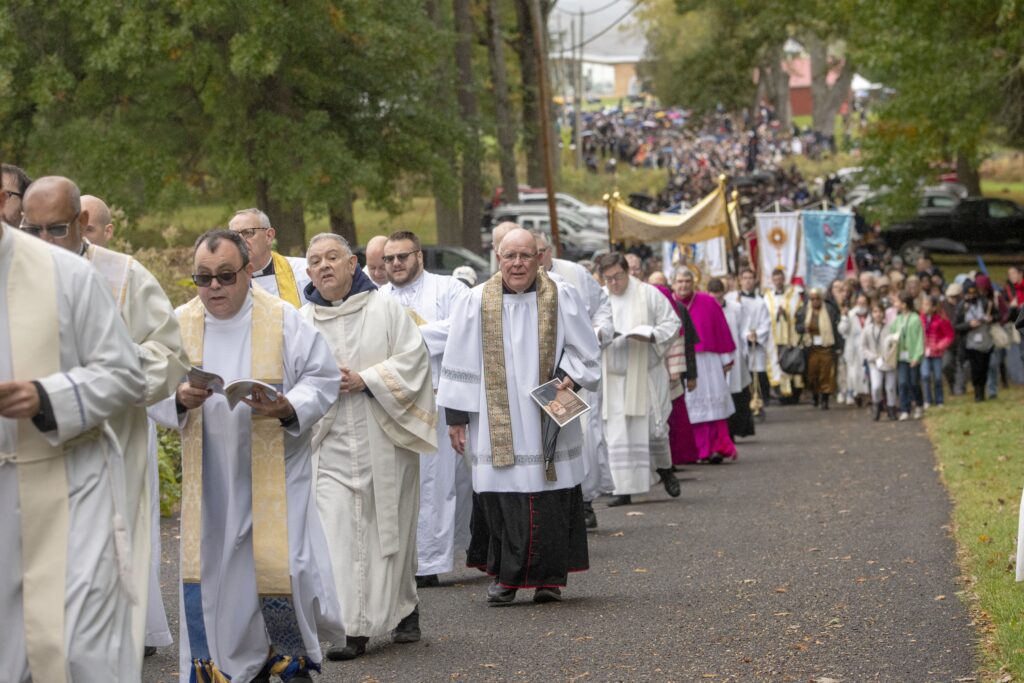 Priests walk in a Eucharistic procession on October 21, 2023, at the Shrine of Our Lady of Martyrs in Auriesville during the New York State Eucharistic Congress on October 20-22.