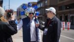 Bob Wilson, director of St. Paul Street Evangelization, interviews a Dallas Cowboys fan outside the NFL Fan Zone near Campus Martius Park in downtown Detroit before the start of the NFL Draft on April 25, 2024.