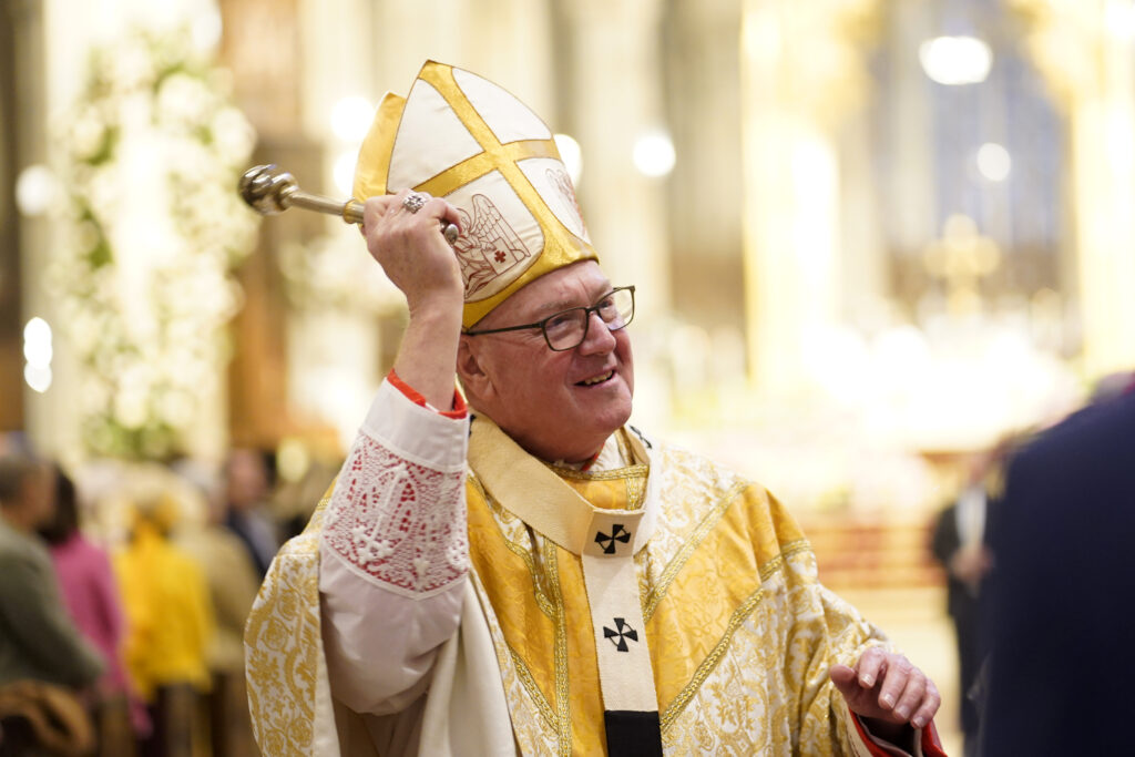 Timothy Cardinal Dolan blesses parishioners at St. Patrick's Cathedral with holy water on Easter Sunday, March 31, 2024. Cardinal Dolan will visit Israel and Palestine from April 12-18, 2024, in his role as chair of Catholic Near East Welfare Association.