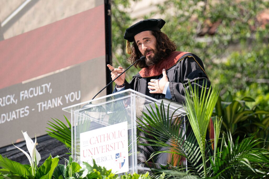 Actor Jonathan Roumie gives the commencement address during the graduation ceremony at The Catholic University of America in Washington May 11, 2024.