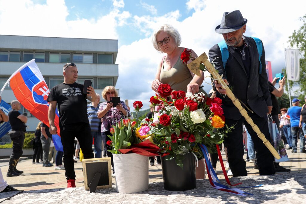 Supporters bring flowers and gifts as they gather near the F.D. Roosevelt University Hospital in Banská Bystrica, Slovakia, where Slovak Prime Minister Robert Fico was hospitalized following an assassination attempt in Handlová on May 15, 2024.