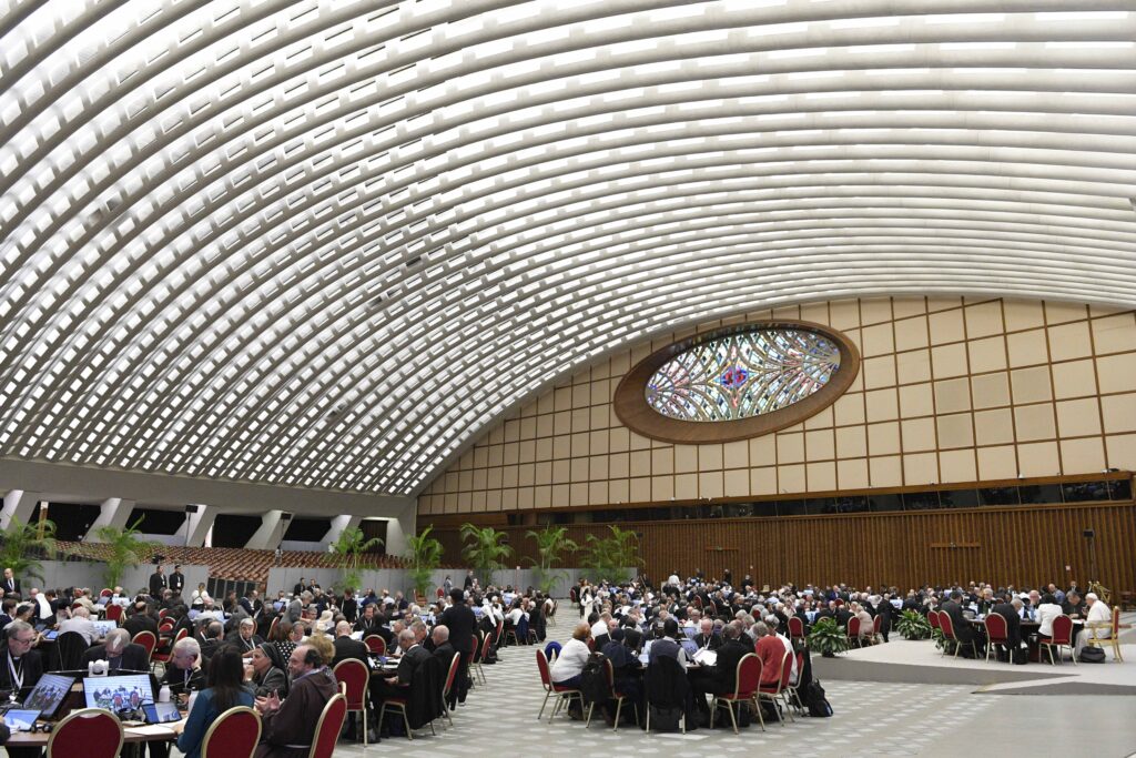 Participants in the assembly of the Synod of Bishops gather on October 25, 2023, for an afternoon session in the Paul VI Audience Hall at the Vatican.