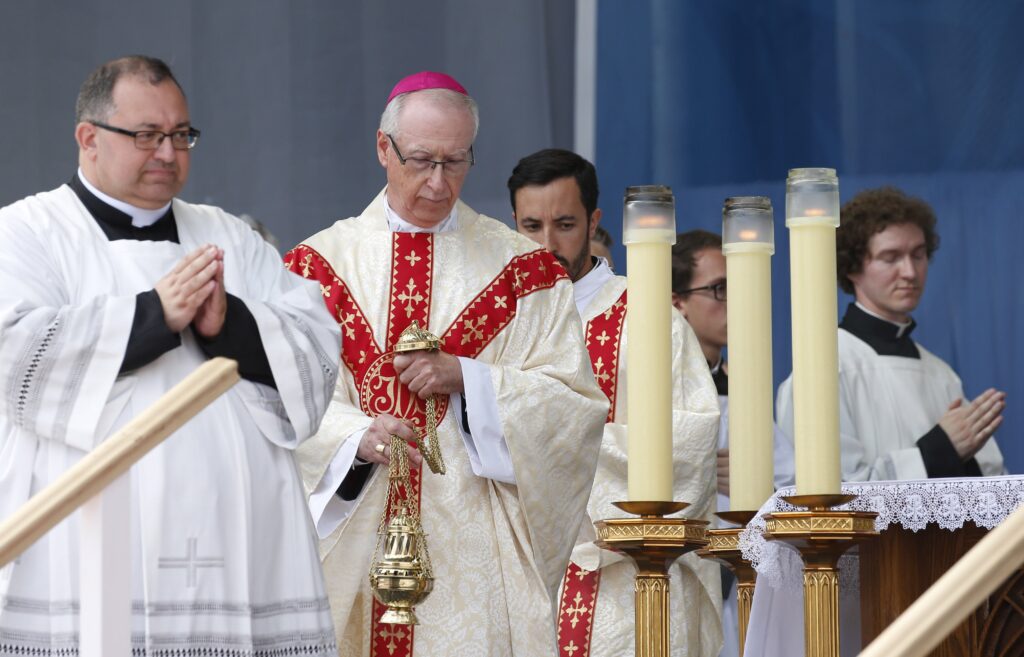 Archbishop Richard Smith of Edmonton, Alberta, burns incense as Pope Francis celebrates Mass at Commonwealth Stadium in Edmonton, Alberta, July 26, 2022.