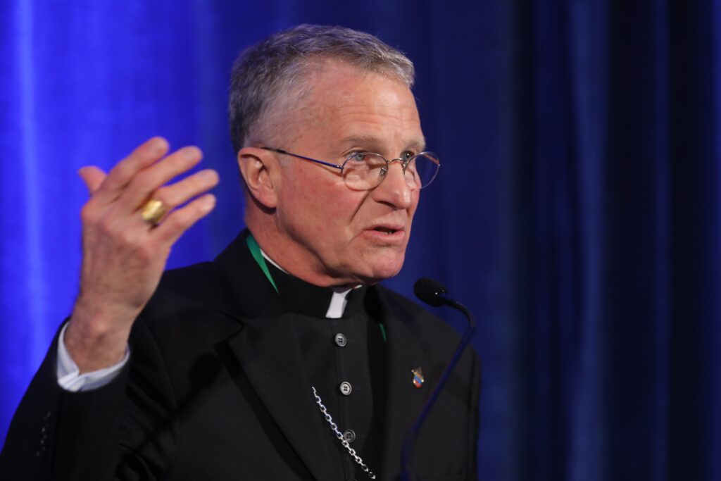 Archbishop Timothy P. Broglio of the U.S. Archdiocese for the Military Services, president of the U.S. Conference of Catholic Bishops, speaks during a news conference at a Nov. 14, 2023, session of the bishops' fall general assembly in Baltimore.