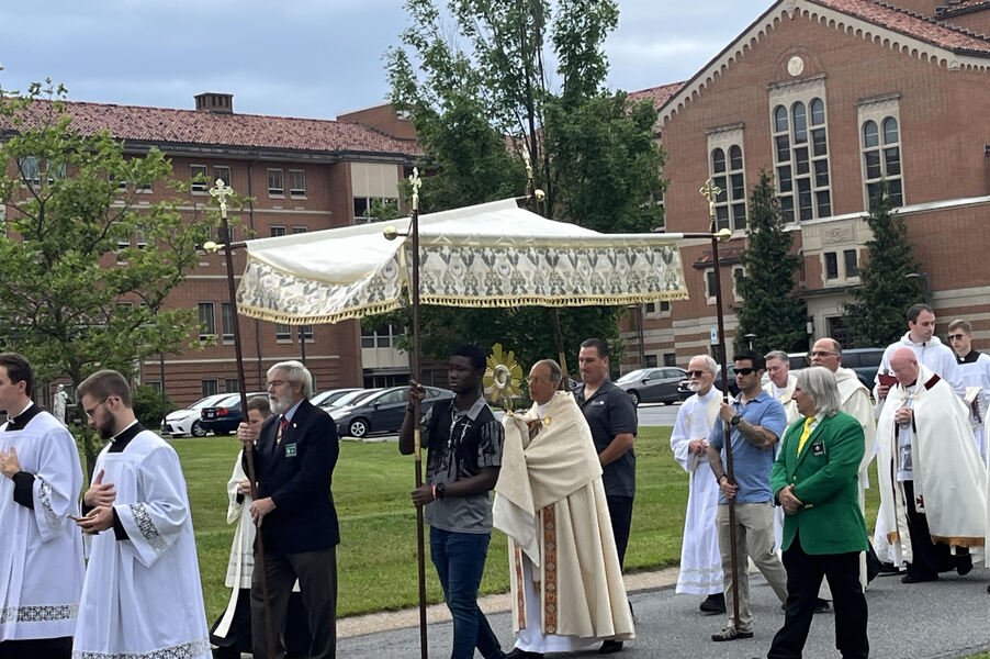 Baltimore Archbishop William E. Lori carries the monstrance at the start of a walk through the streets of Emmitsburg, Maryland, on June 6, 2024, after celebrating Mass at the National Shrine of St. Elizabeth Ann Seton.