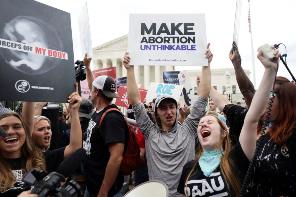 Pro-life demonstrators in Washington celebrate outside the Supreme Court June 24, 2022, as the court overruled the landmark Roe v. Wade abortion decision.