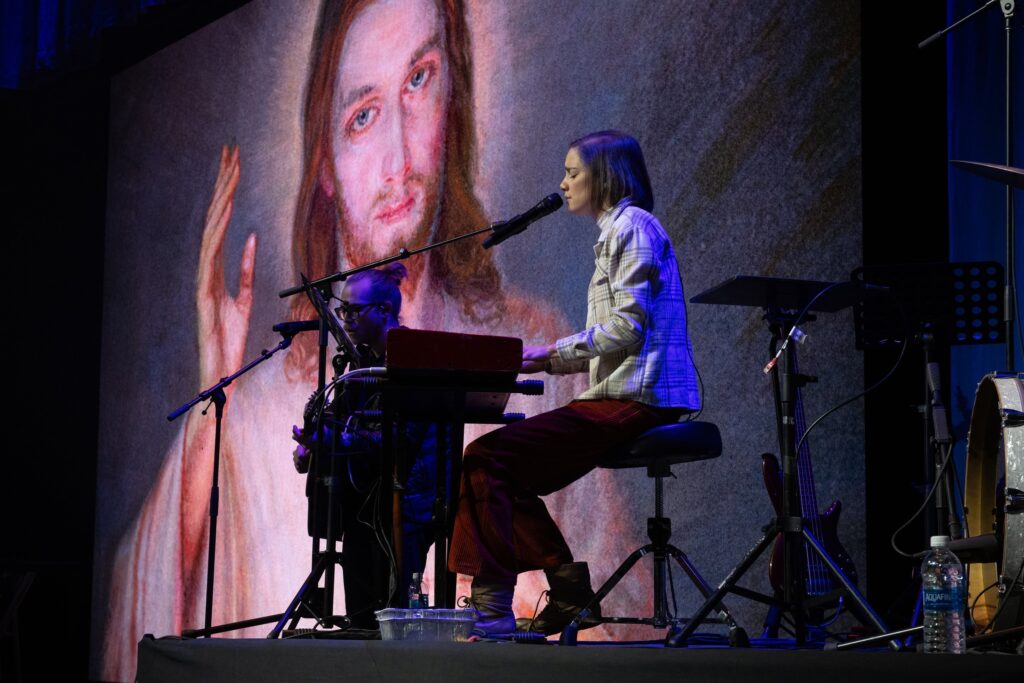 Songwriter Sarah Kroger sings during Eucharistic adoration for Life Fest at the D.C. Armory in Washington on Jan. 19, 2024.