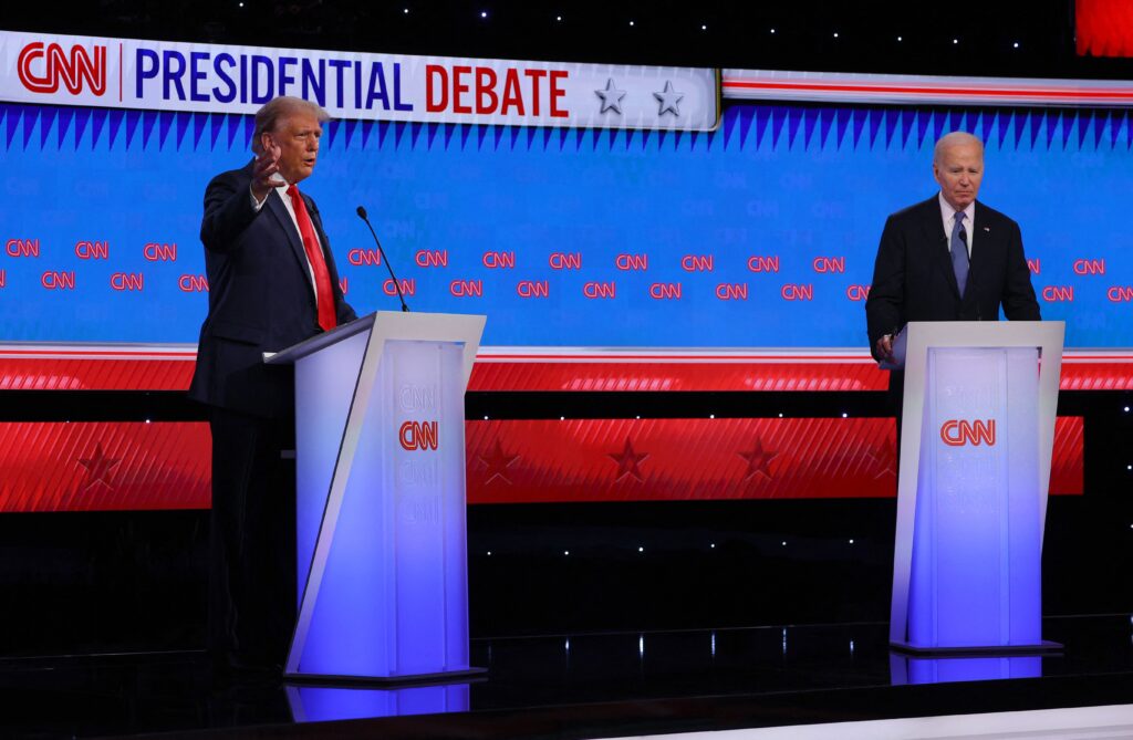 Former President Donald Trump (left) and President Joe Biden participate in their first U.S. presidential campaign debate in Atlanta on June 27, 2024.