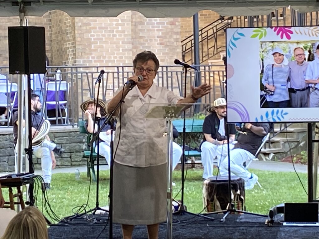 Sister Pietrina Raccuglia, MSC, addresses supporters and guests of Cabrini Immigrant Services NYC, at that organization's 25th anniversary celebration in Washington Heights, on June 15, 2024.