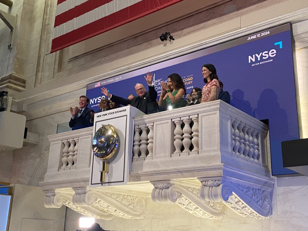 Cardinal Timothy Dolan (center) rang the opening bell at the New York Stock Exchange on behalf of Catholic Charities of New York, June 17, 2024.