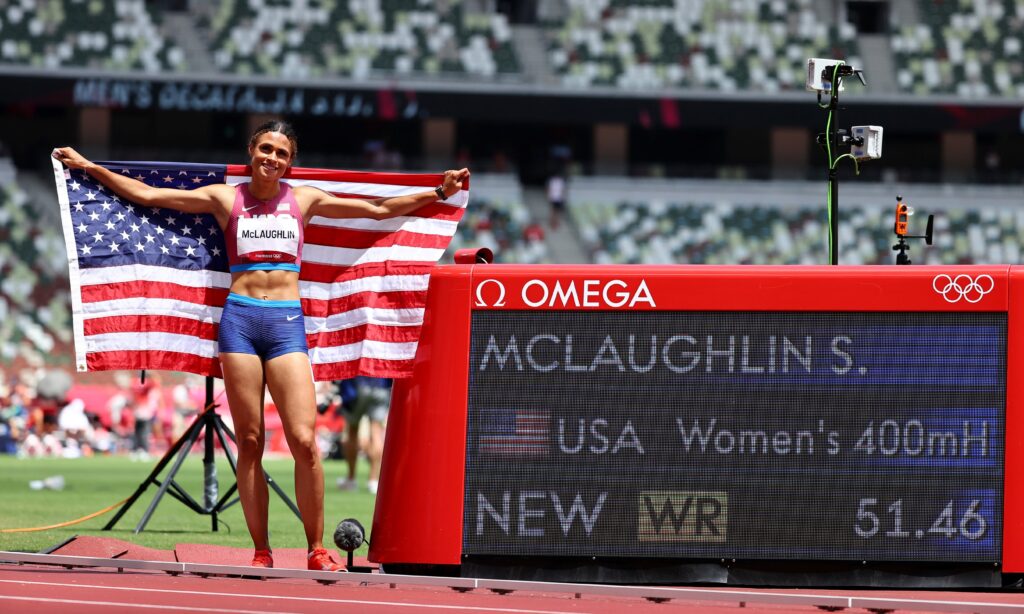 U.S. runner and gold medalist Sydney McLaughlin celebrates Aug. 4, 2021, after breaking the world record to win the women's 400-meter hurdles final at Olympic Stadium at the 2020 Tokyo Olympics.