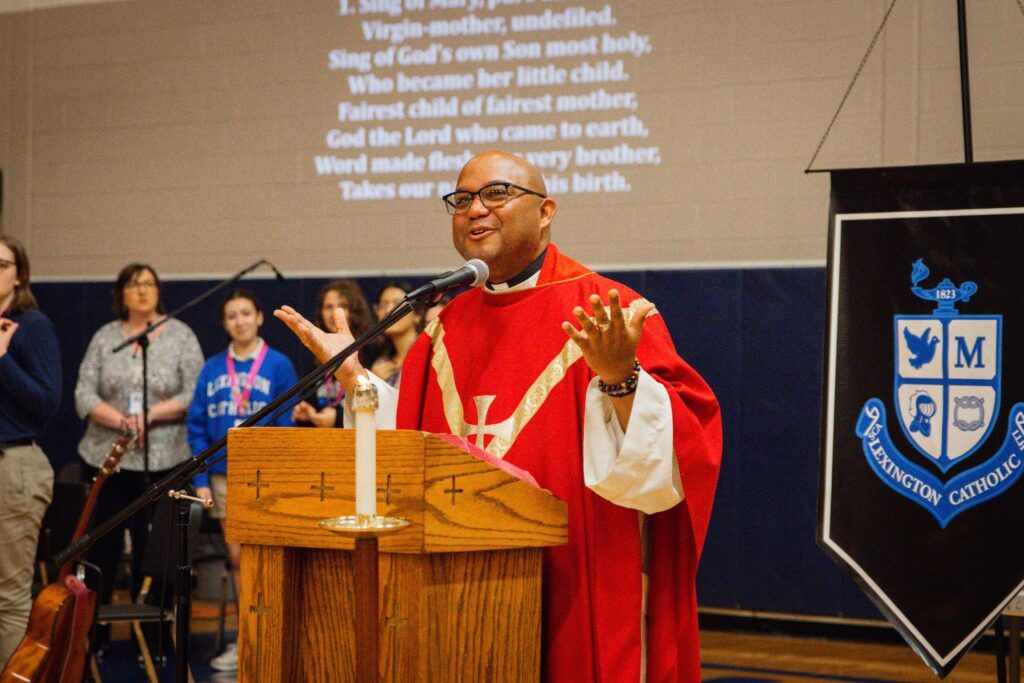 Father Norman Fischer speaks at Lexington Catholic High School in this undated photo.