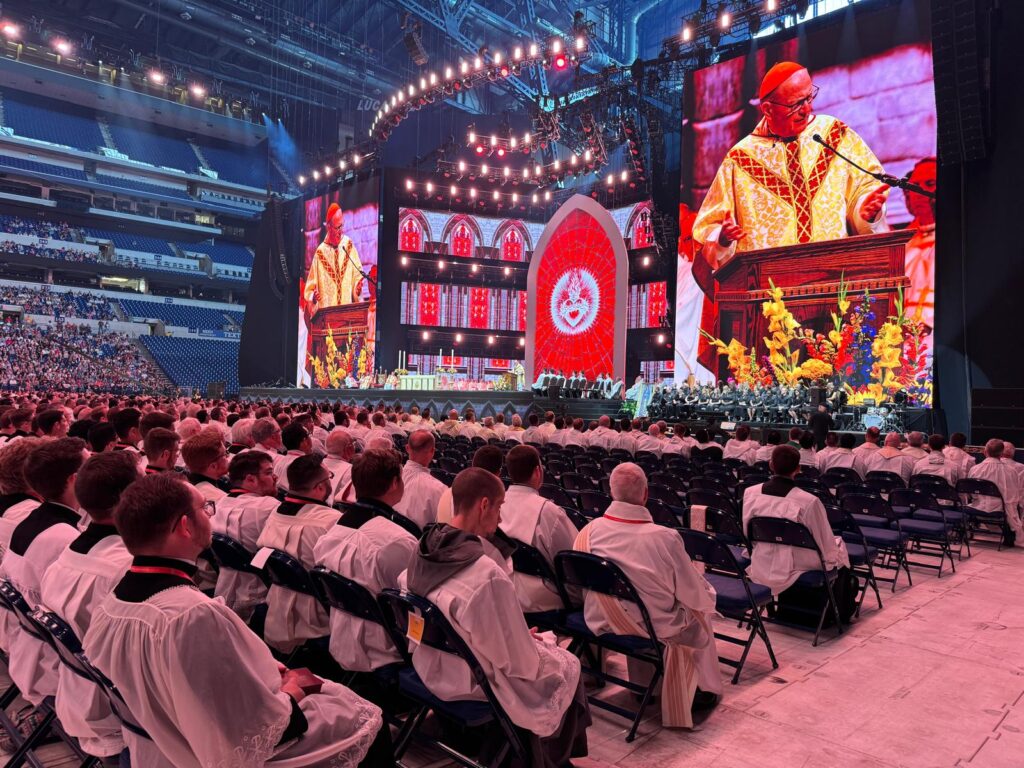 Cardinal Timothy Dolan, Archbishop of New York, celebrates the opening Mass at the National Eucharistic Congress at Lucas Oil Stadium in Indianapolis, July 18, 2024.