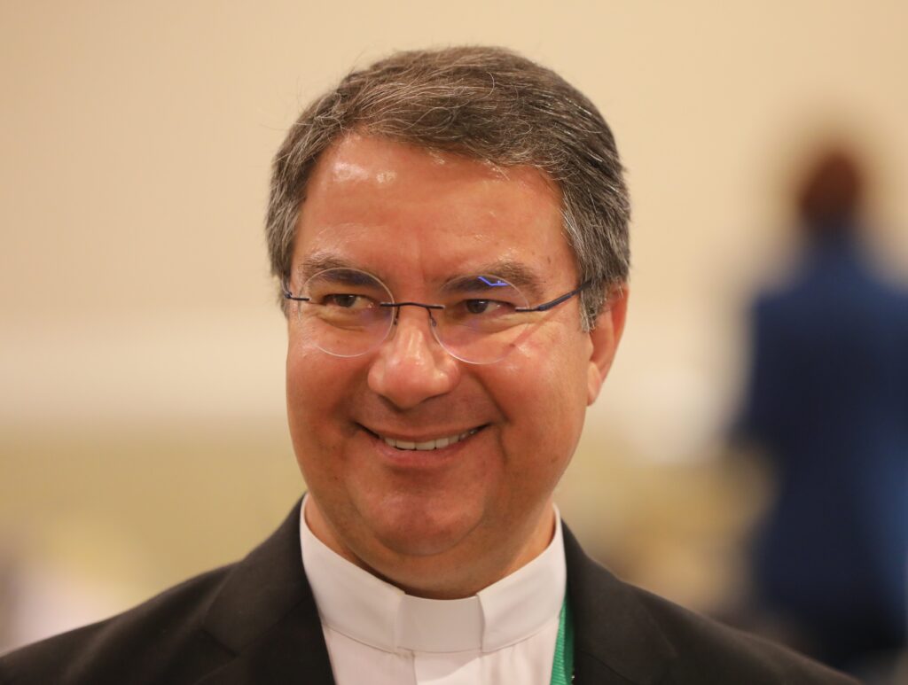 Bishop Oscar Cantú of San Jose, California, smiles during a break June 16, 2023, at the U.S. Conference of Catholic Bishops' spring assembly in Orlando, Florida.