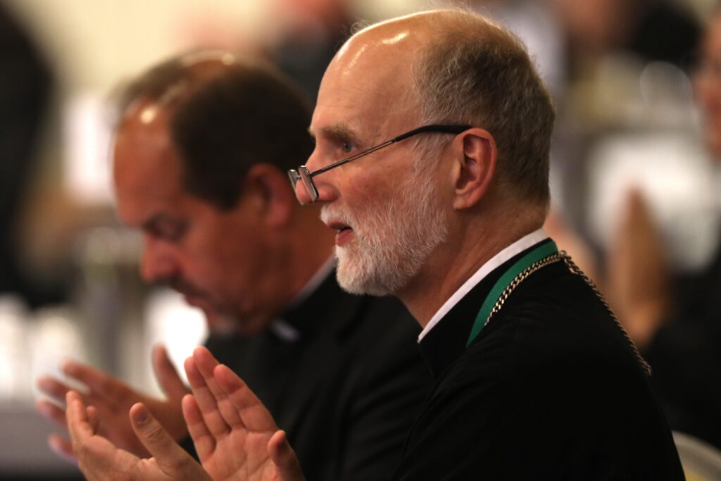 Metropolitan Archbishop Borys A. Gudziak of the Ukrainian Catholic Archeparchy of Philadelphia applauds June 15, 2023, during the U.S. Conference of Catholic Bishops' spring plenary assembly in Orlando, Florida.