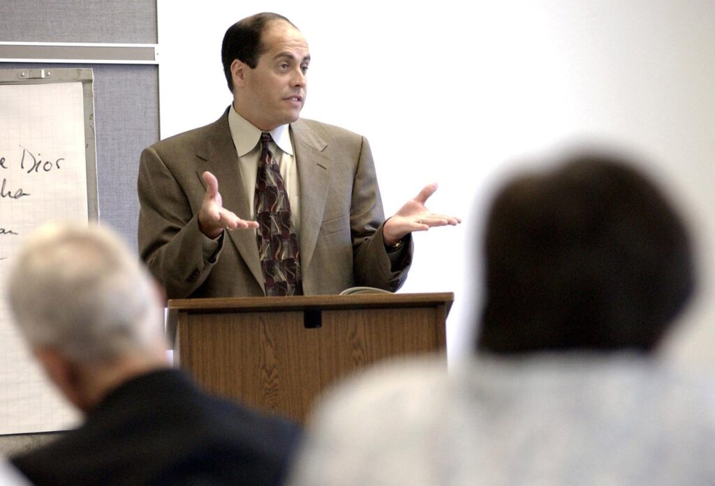 Alejandro Aguilera-Titus, associate director of the U.S. bishops' Secretariat for Hispanic Affairs, talks about the state of Hispanic ministry in the United States during a meeting with Hispanic church representatives in Dover, Delaware.