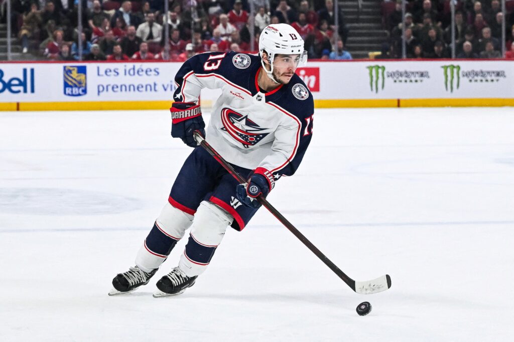 Columbus Blue Jackets left wing Johnny Gaudreau (13) plays the puck against the Montreal Canadiens during the second period at Bell Centre in Montreal on March 12, 2024.