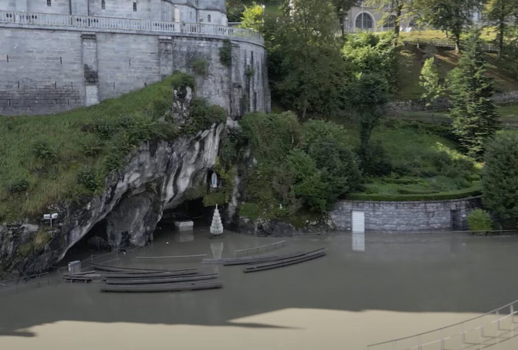 After river flooding had forced the temporary closure of the famous grotto at the shrine of Our Lady of Lourdes in southern France September 7, 2024, the grotto was cleaned and was reopened, with no pilgrimages canceled. Flooded grotto is seen on screenshot of the sanctuary's September 7 video.