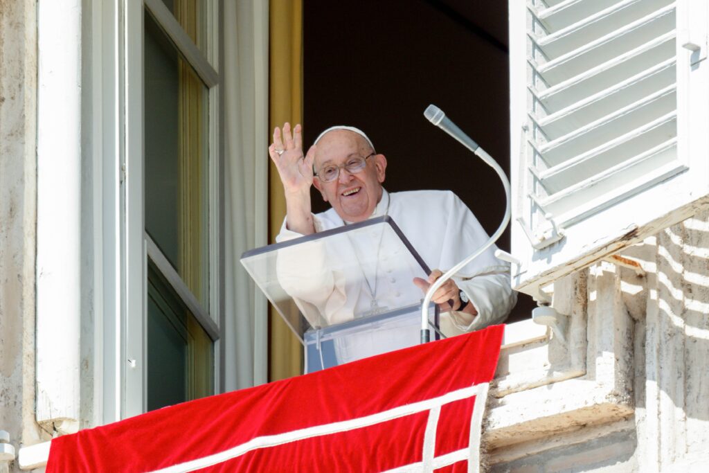 Pope Francis greets visitors gathered in St. Peter's Square to pray the Angelus at the Vatican September 15, 2024.