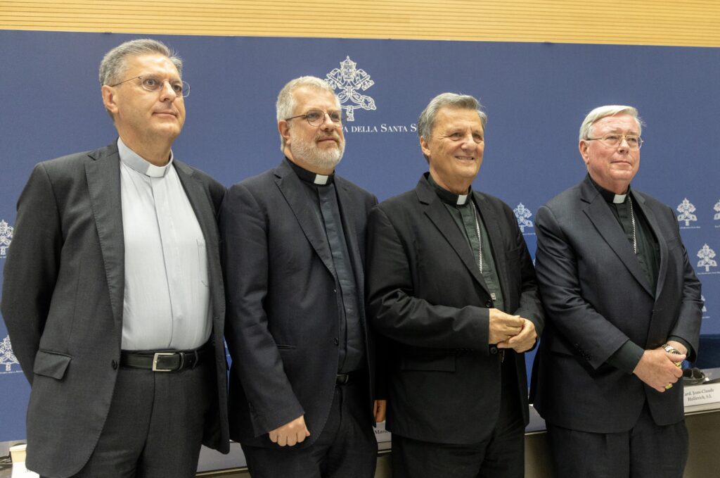 Members of the General Secretariat of the Synod pose for a photo after a news conference at the Vatican on September 16, 2024.