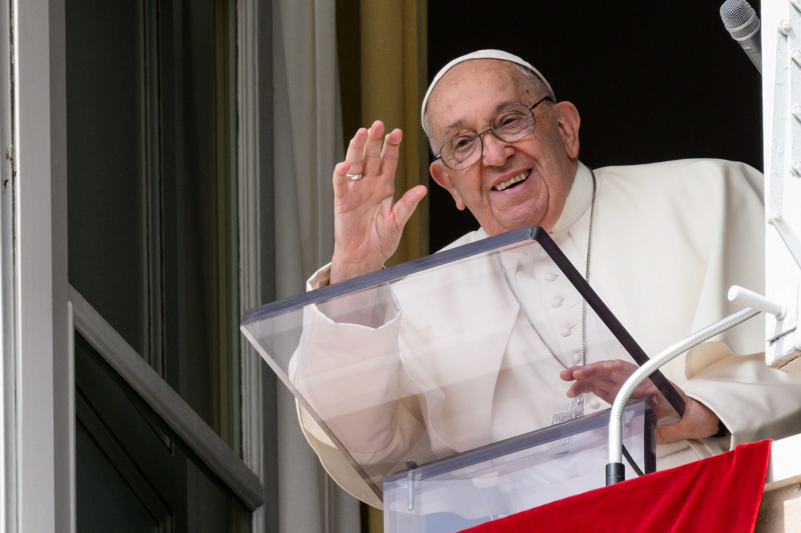 Pope Francis greets visitors gathered in St. Peter's Square to pray the Angelus at the Vatican September 22, 2024.