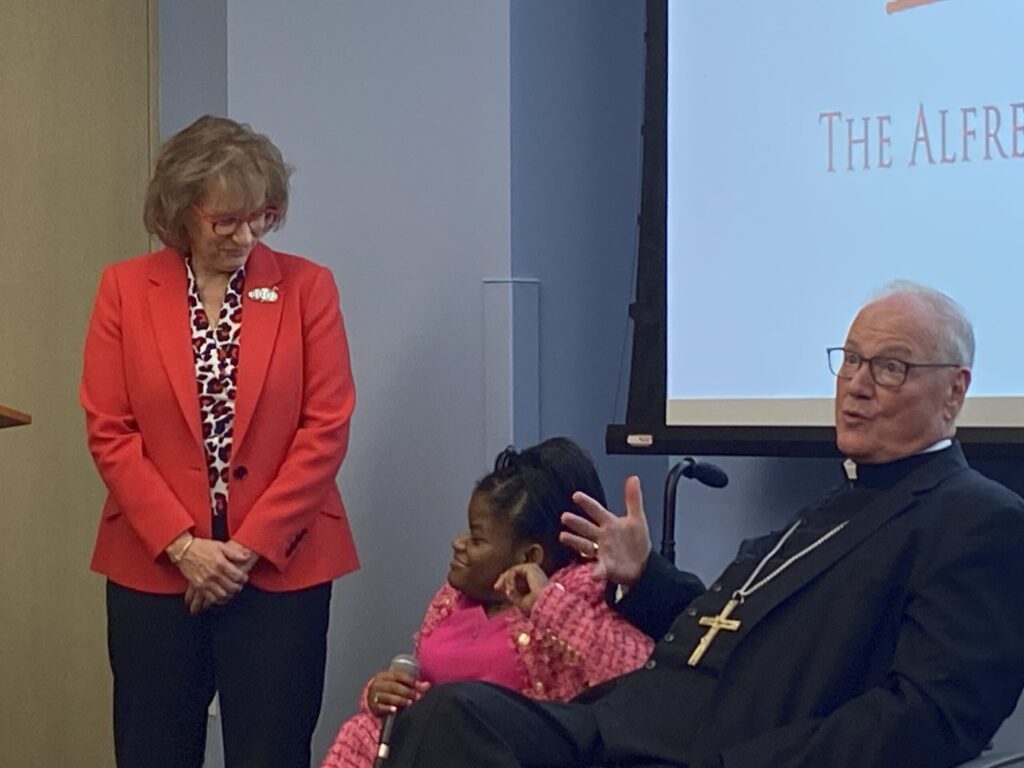 Cardinal Timothy Dolan (right) answers questions with Pat Tursi, CEO of Elizabeth Seton Children's (center) and Stephanie Gabaud, international spokesperson and volunteer for Elizabeth Seton Children's, at an event at the Yonkers facility on September 23, 2024.