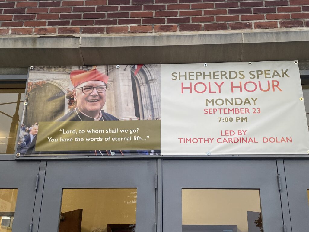 A banner at St. Lawrence O'Toole parish in Brewster promotes a holy hour and talk led by Cardinal Timothy Dolan, September 23, 2024.