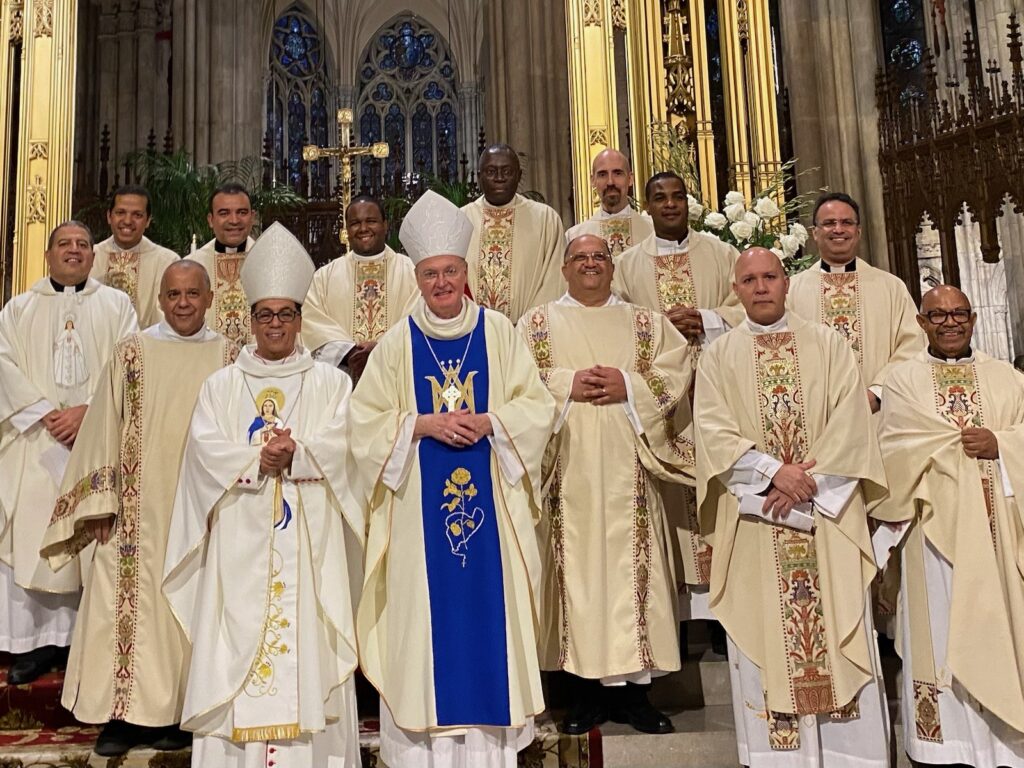 Bishop Santiago Rodriguez and Archdiocese of New York Auxiliary Bishop Edmund J. Whalen, vicar for clergy, in a group photo with concelebrants after the Spanish Mass in honor of Our Lady of Mercy at St. Patrick's Cathedral, Sunday, September 22, 2024.