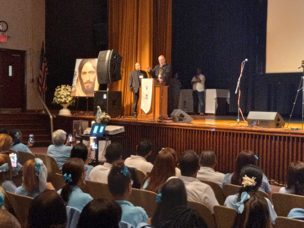 Cardinal Timothy Dolan during his reflection at the IX Congreso de Emaus at Cardinal Spellman High School in the Bronx, Saturday, September 21, 2024. Next to him is Father Ambiorix Rodriguez, archdiocesan Emaus spiritual director.