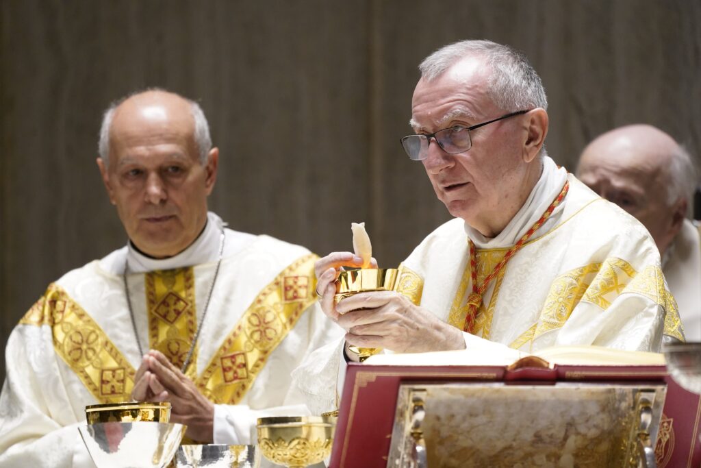 Cardinal Pietro Parolin, Vatican secretary of state, elevates the Eucharist during Mass at Holy Family Church in New York City September 30, 2024.