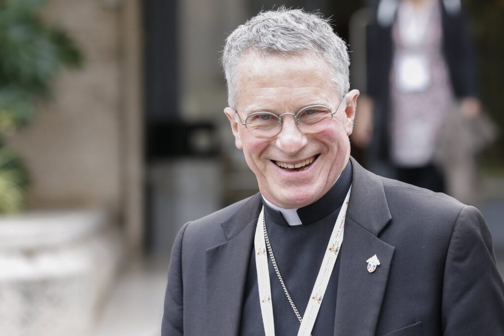 Archbishop Timothy P. Broglio of the U.S. Archdiocese for the Military Services, exits the Paul VI Audience Hall at the Vatican after the morning session of the Synod of Bishops on synodality October 7, 2024.