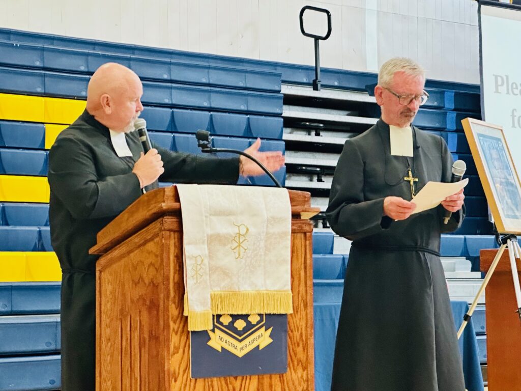 Brother Dan O’Riordan, provincial of the Marist Brothers' U.S. Province (left) and Brother Michael Flanigan, president of Mount St. Michael Academy, appear at Brother Flanigan's installation on Friday, September 27, 2024.