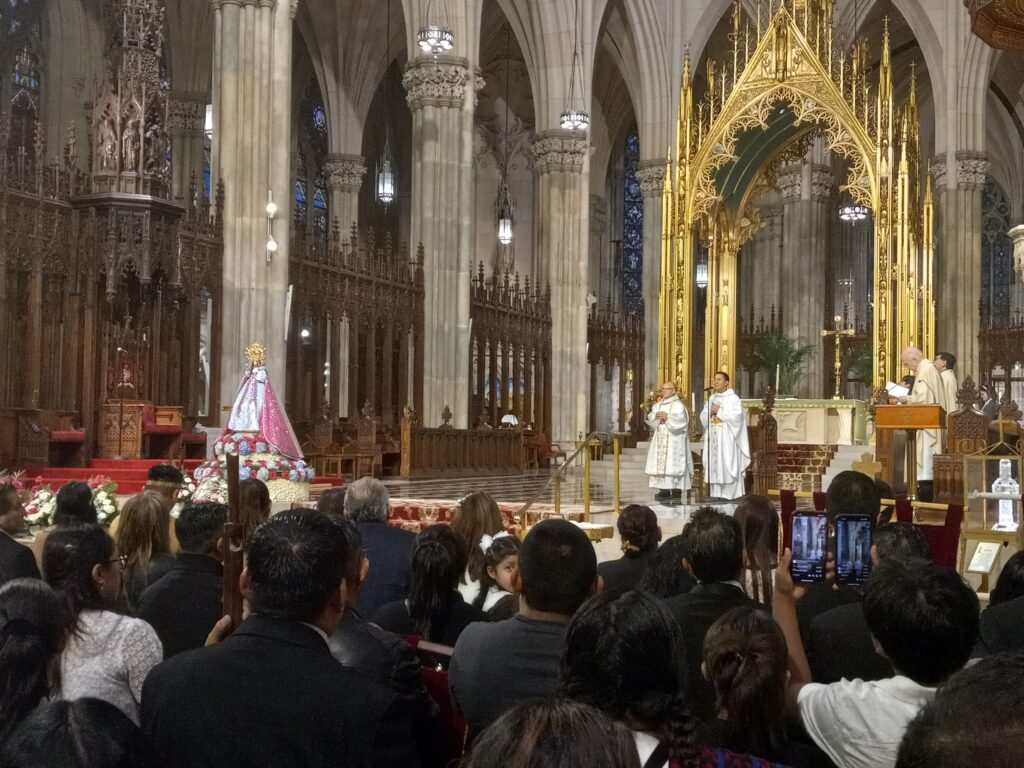 Father William R. Arteaga Vera, right, and Deacon Carlos Campoverde during the early moments of the Our Lady of Cisne Mass at St. Patrick’s Cathedral, Sunday, September 29, 2024.