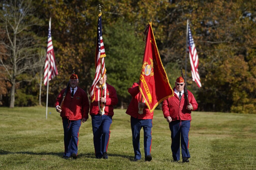 Members of the Marine Corps League are seen marching at the beginning of a Veterans Day ceremony on November 11, 2021, at Calverton National Cemetery in Calverton.