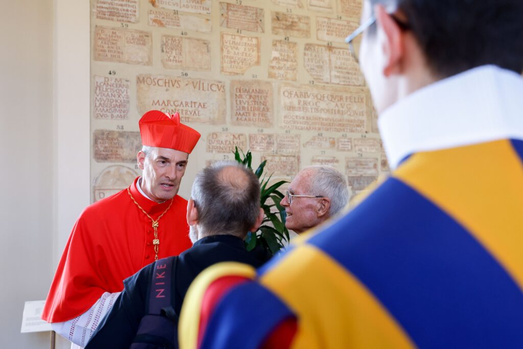 Cardinal François-Xavier Bustillo of Ajaccio, on the French island of Corsica, greets well-wishers in the Apostolic Palace at the Vatican after a consistory where Pope Francis made him and 20 other prelates cardinals September 30, 2023.