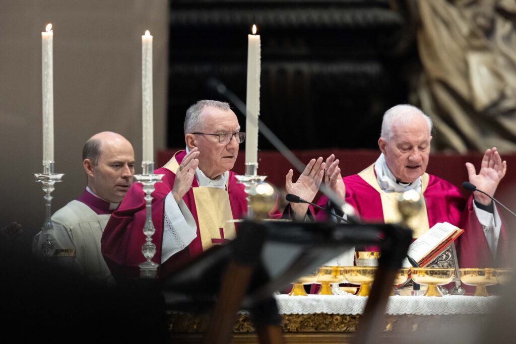 Cardinal Pietro Parolin, Vatican secretary of state, right, and retired Canadian Cardinal Marc Ouellet pray during a memorial Mass with Pope Francis for cardinals and bishops who died in the past year at the Altar of the Chair in St. Peter’s Basilica at the Vatican, November 4, 2024.