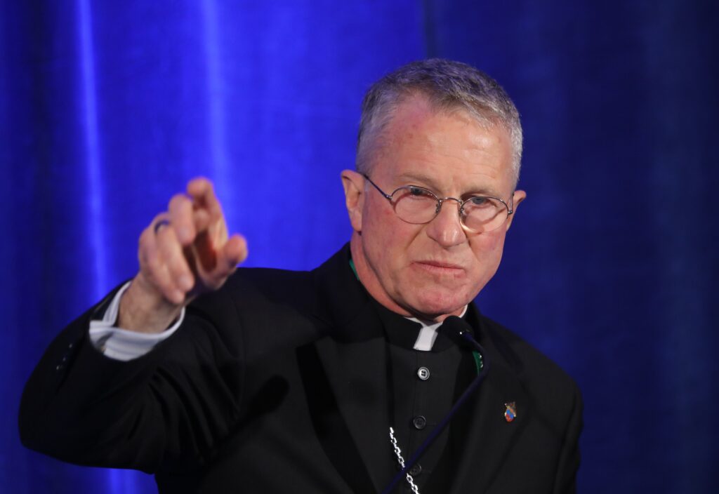 Archbishop Timothy P. Broglio of the U.S. Archdiocese for the Military Services, president of the U.S. Conference of Catholic Bishops, speaks during a news conference at a November 14, 2023, session of the bishops' fall general assembly in Baltimore.