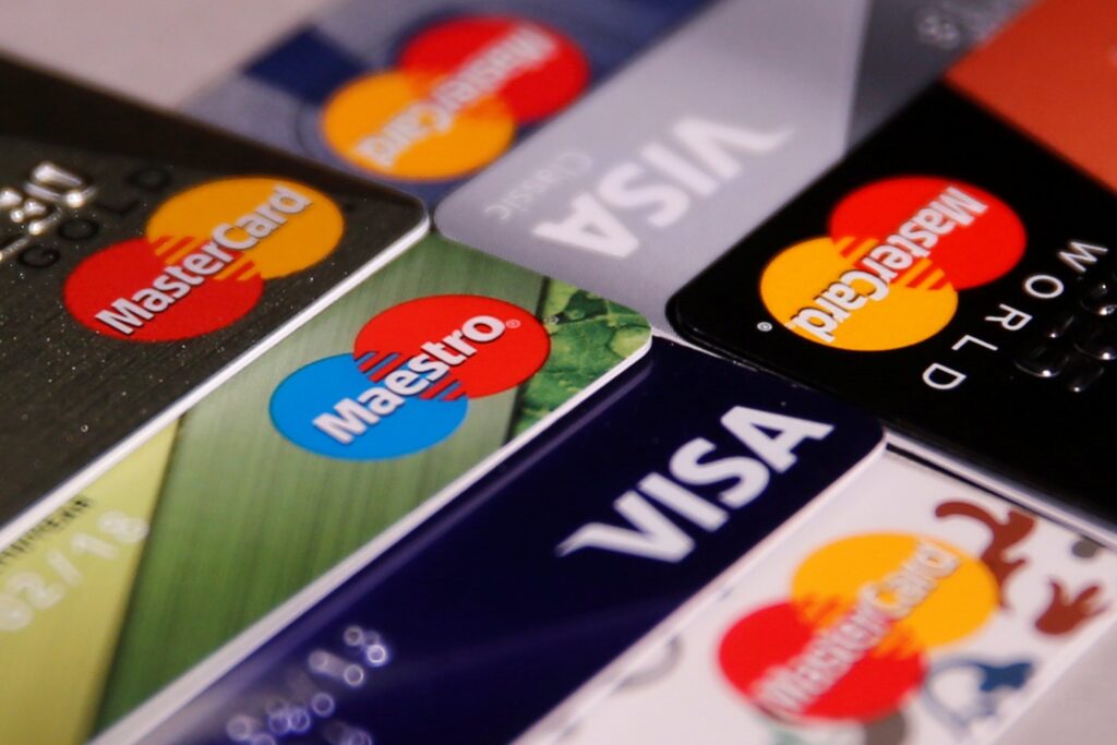Various credit cards are displayed in a photo illustration.