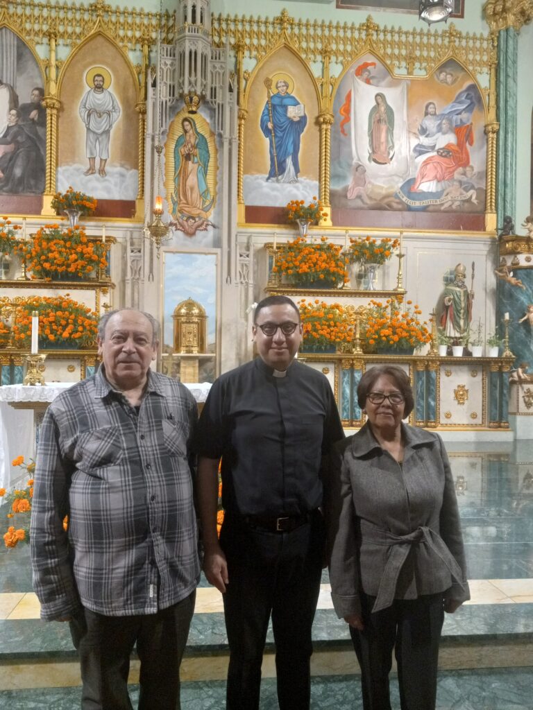 Father Jesus Ledezma, pastor of the Shrine of Our Lady of Guadalupe at St. Bernard, Manhattan, with parish volunteers Antonio Gomez and Concepcion Perez inside the shrine, November 4, 2024.