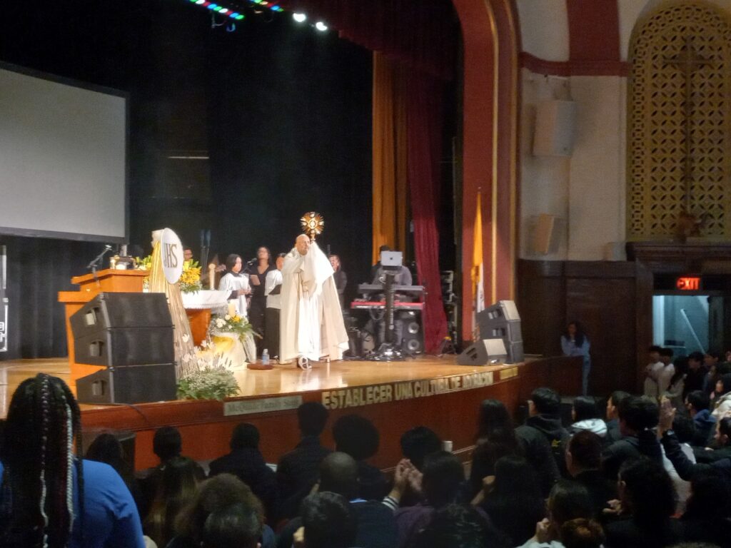 Bishop Joseph Espaillat leads Adoration during the Renewal IX (Renovación) youth gathering at Cardinal Hayes High School in the Bronx, Friday, November 22, 2024.