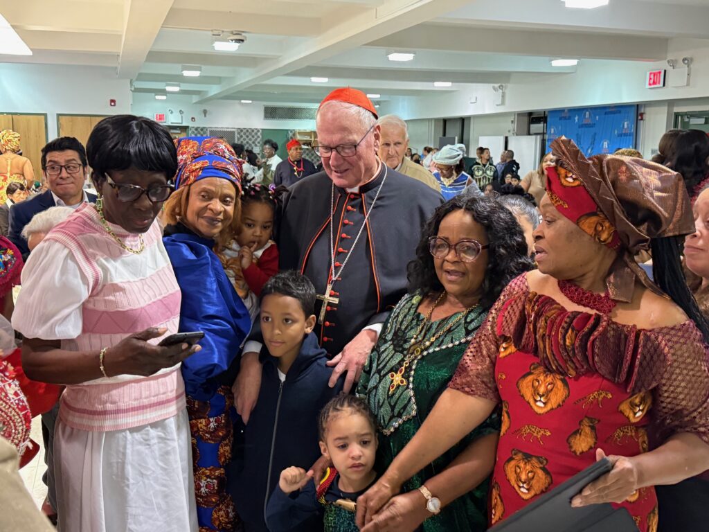 Cardinal Timothy Dolan (center) greets parishioners of the Nativity of Our Blessed Lady Church in the Bronx, during celebrations of its 100th anniversary on November 16, 2024.