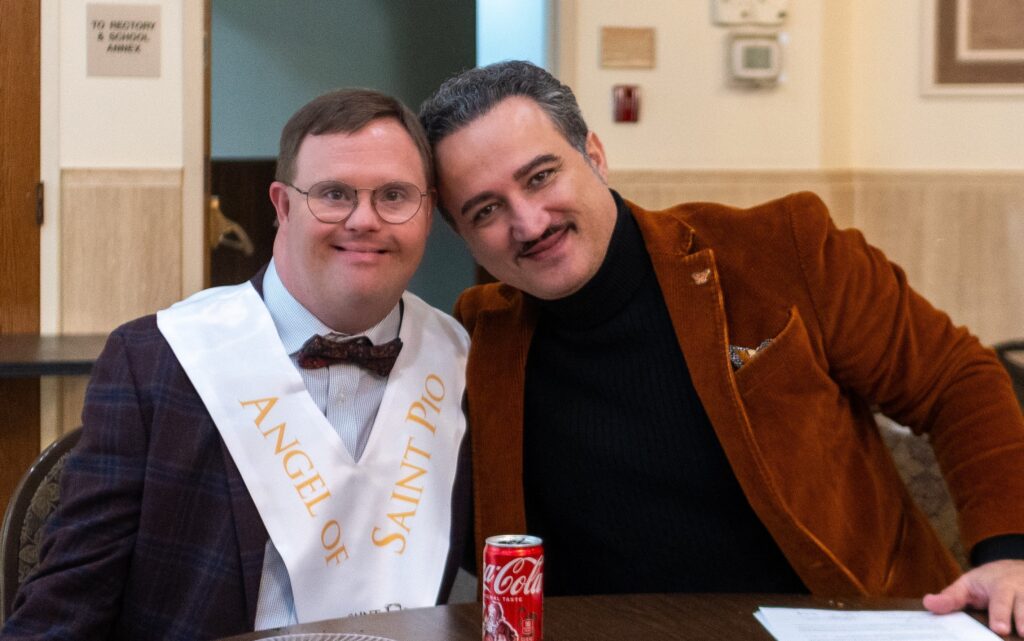 Eric Latcheran, a young man with Down syndrome, has been appointed as the first "Angel of St. Pio" by the St. Pio Foundation for his extraordinary faith and perseverance amid difficulties -- and for his intense devotion to the beloved saint. He is pictured next to Luciano Lamonarca, founder and CEO of the St. Pio Foundation, during an event at the Casa Italiana in Washington, on December 4, 2024.