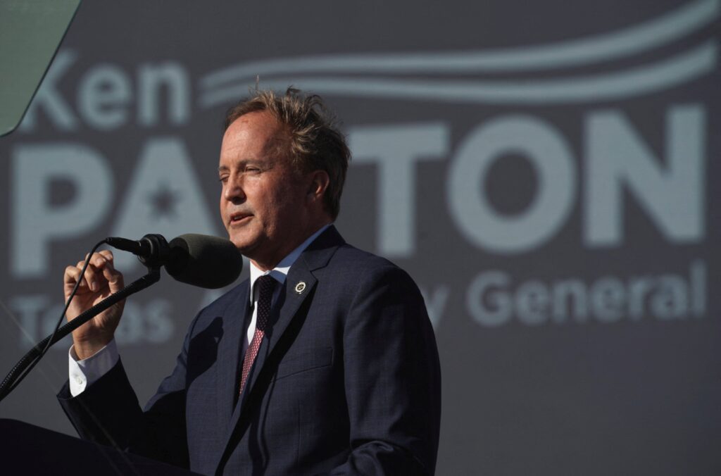 Texas Attorney General Ken Paxton speaks ahead of a rally held by former U.S. President Donald Trump, in Robstown, Texas, October 22, 2022.