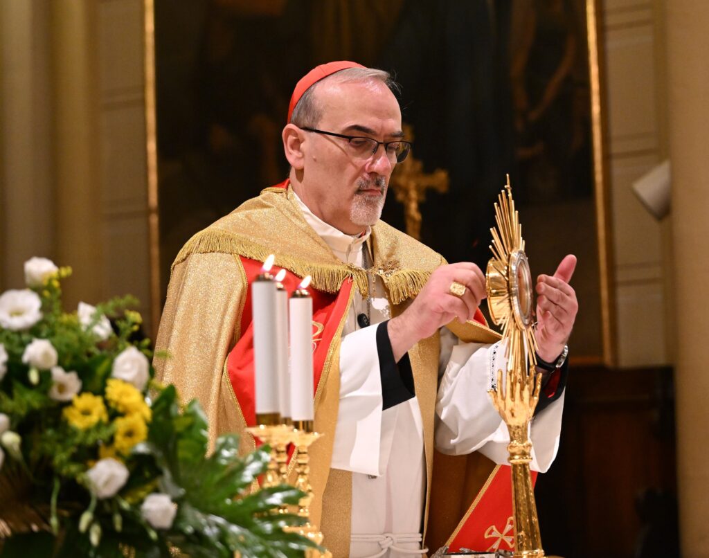 Cardinal Pierbattista Pizzaballa, the Latin patriarch of Jerusalem, presides over an hour of adoration and vespers on October 7, 2024, in the Pro Cathedral of the Latin Patriarchate in the Old City of Jerusalem on a day of fasting, penance, and prayer for peace in the Holy Land.